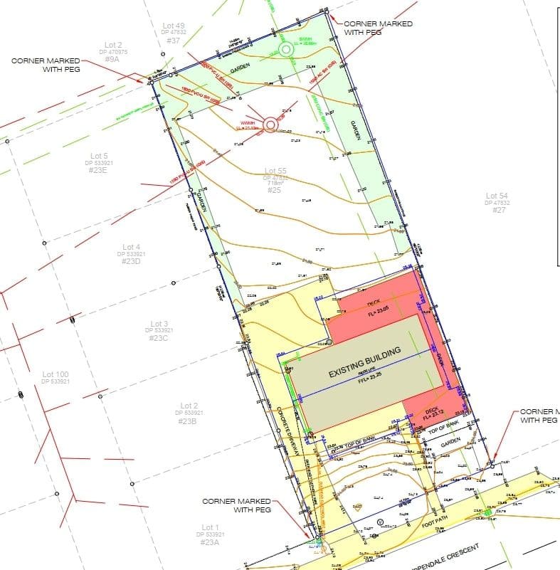 Example topographic survey plan showing contours, an existing building, decks, driveway and boundary pegs on a residential lot
